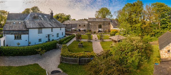 Farmhouse and cottages around the courtyard garden